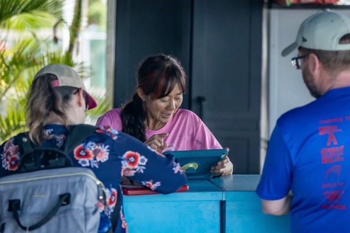 a man in a blue shirt