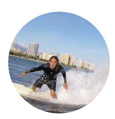 a man riding a wave on a surfboard in the water