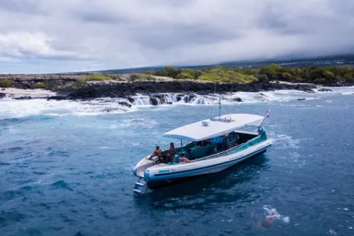 a small boat in a body of water