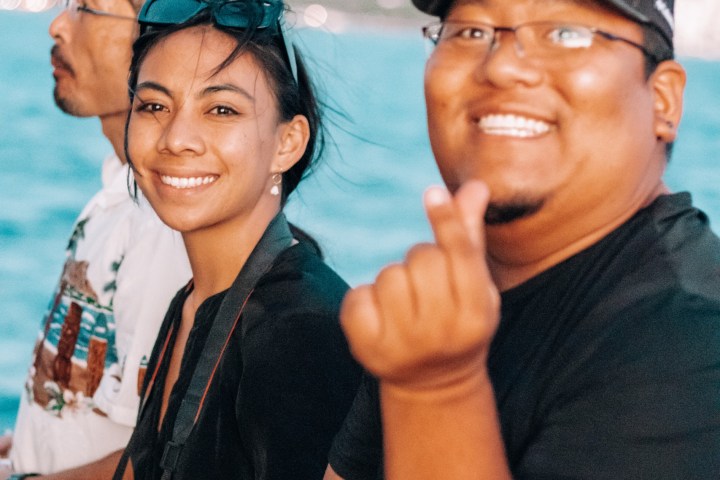 a group of people posing for the camera