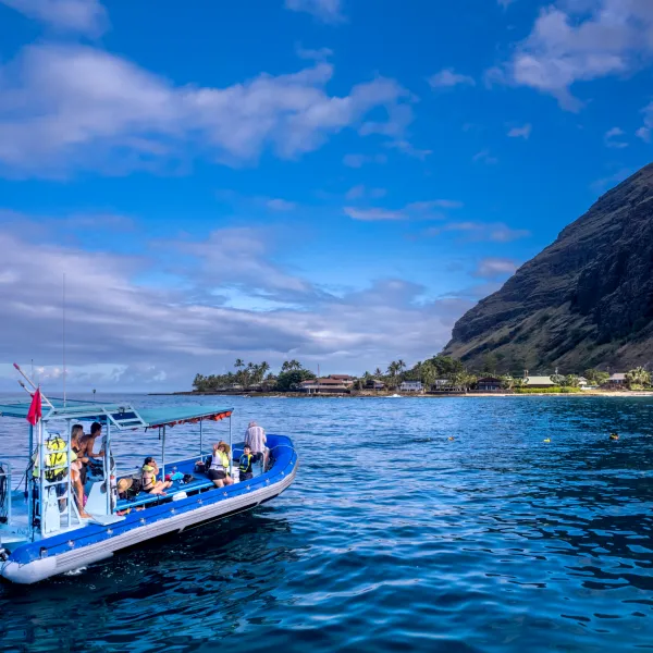 a small boat in a large body of water