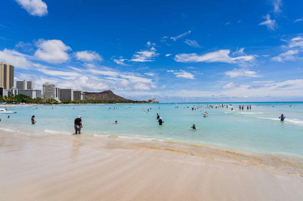 a group of people on Waikiki Beach